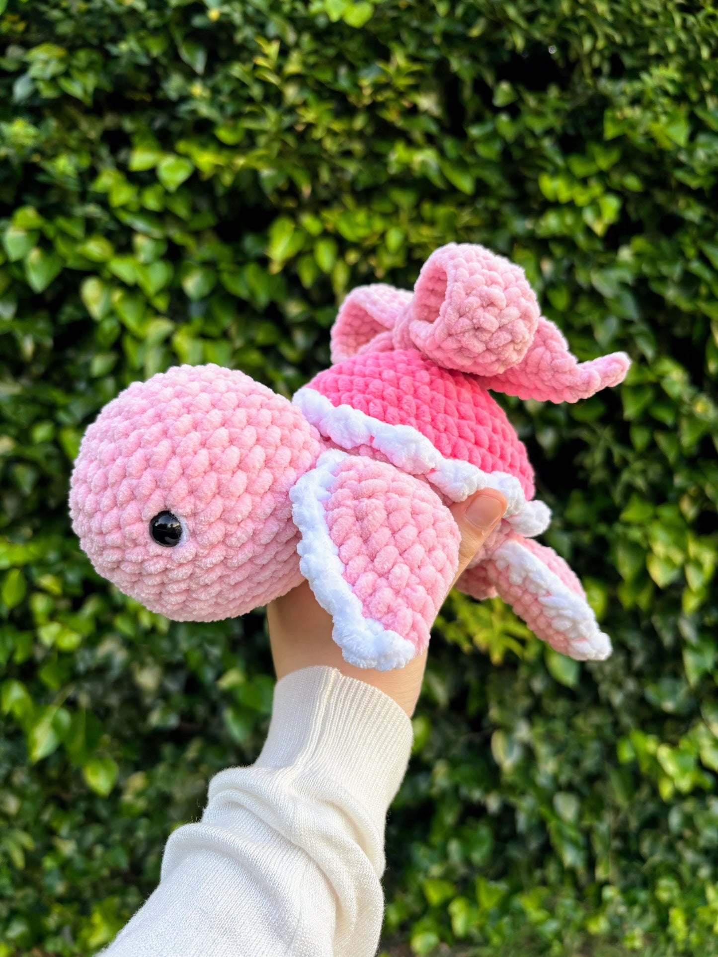 Tortuga rosa con lazo